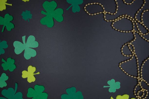 istock St. Patrick's Day Background clover leaves on blackboard 645068668