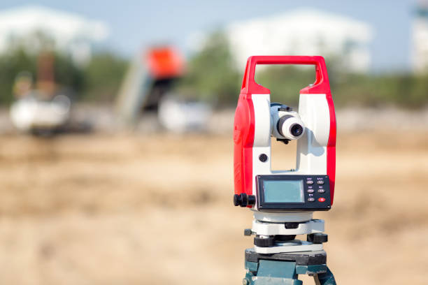 istock Surveyor equipment tacheometer or theodolite outdoors at construction site for civil engineer checking the construction area 645074864