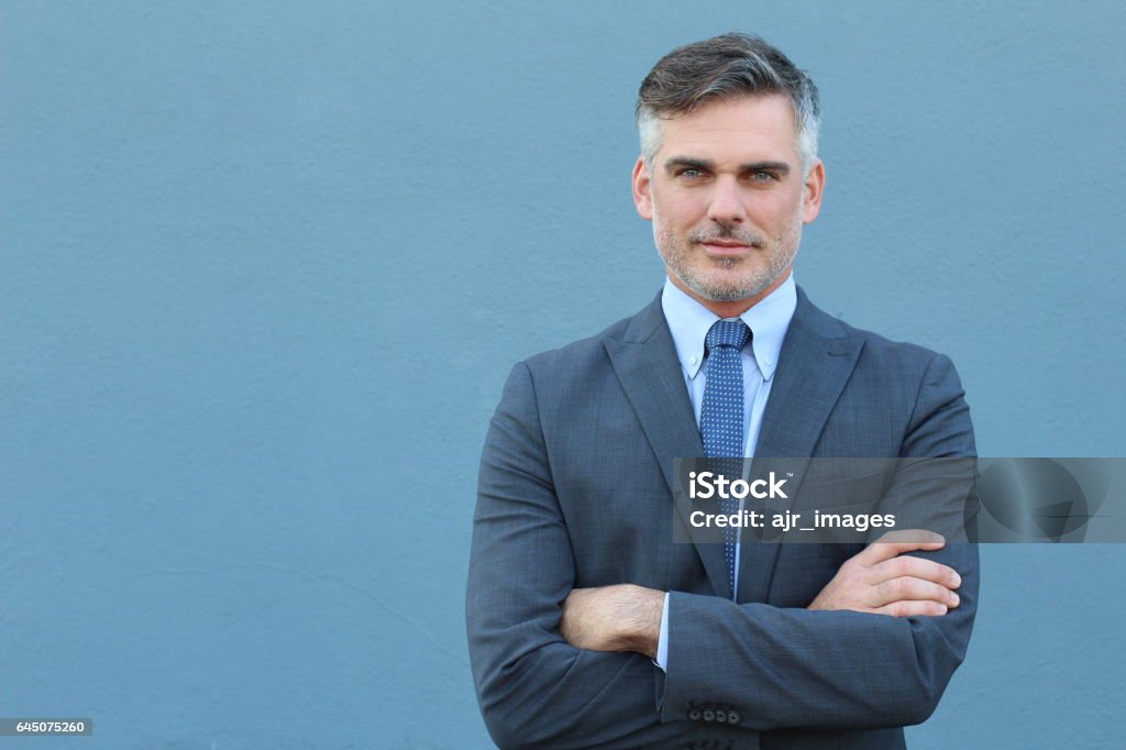 Successful Caucasian elegant businessman isolated Successful Caucasian elegant businessman isolated with arms crossed. Full Suit Stock Photo