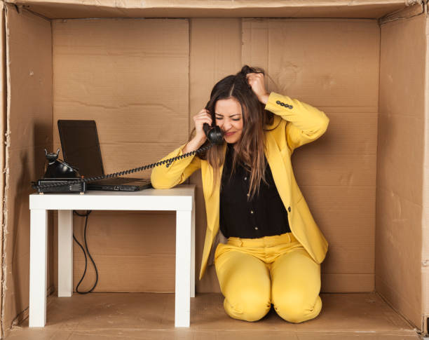 istock angry business woman pulls her hair during a telephone conversation 645076422