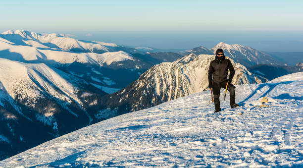 istock Hiker with ice axes in the mountains. 645081678