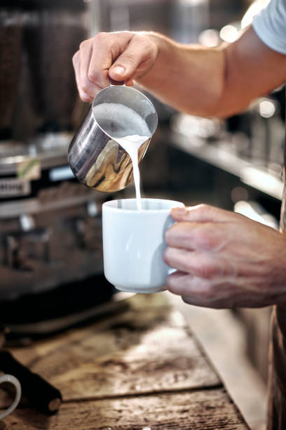 istock Barista steaming milk 645085364