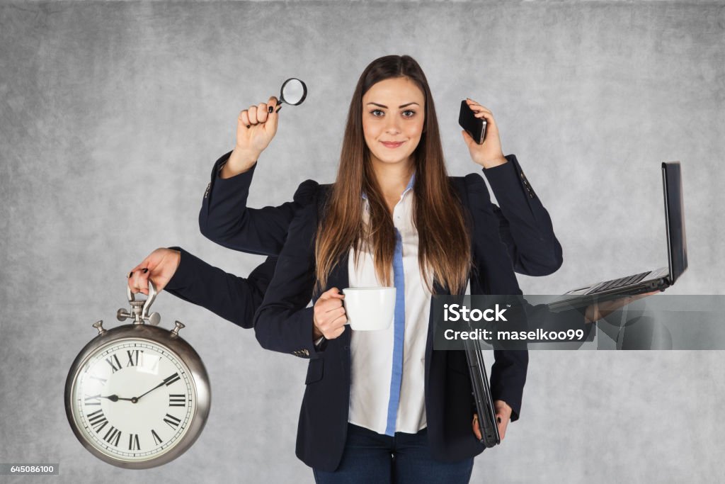 multi-purpose business woman with a large number of hands Multi-Tasking Stock Photo