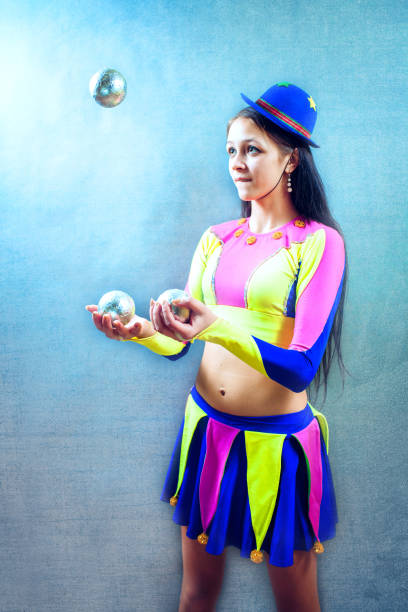 istock Crazy young girl in a suit  clown 645086270