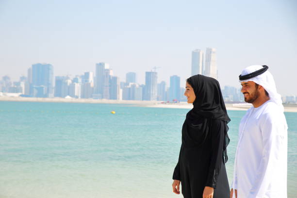 istock Emirati couple in the Beach 645088930