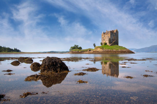 A well-preserved medieval tower-house situated on a tidal islet on Loch Laich. Founded around 1440 the castle has variously been associated with the Clans of MacDougall, Stewart and Campbell.