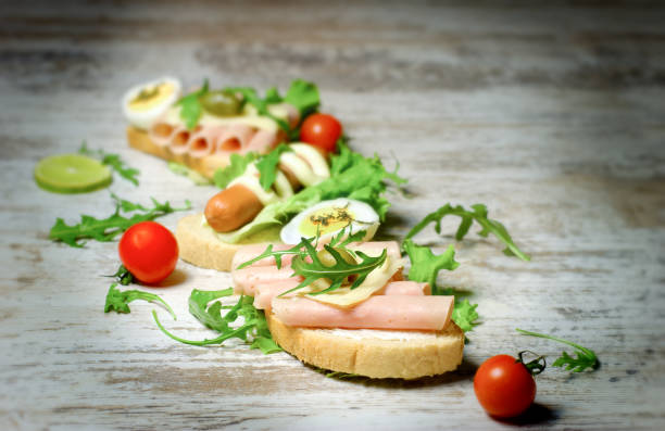 istock Sandwich with ham and sandwich with hot dog-frankfurter 645096720