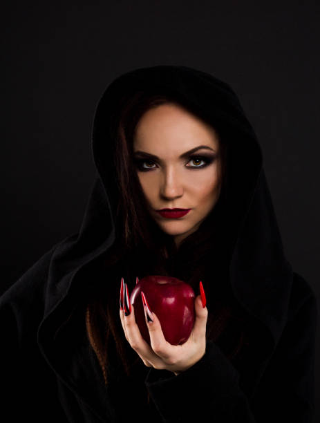 istock Stepmother gives poisoned red apple 645100062