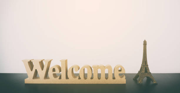 istock Welcome text on table welcome to paris 645134360