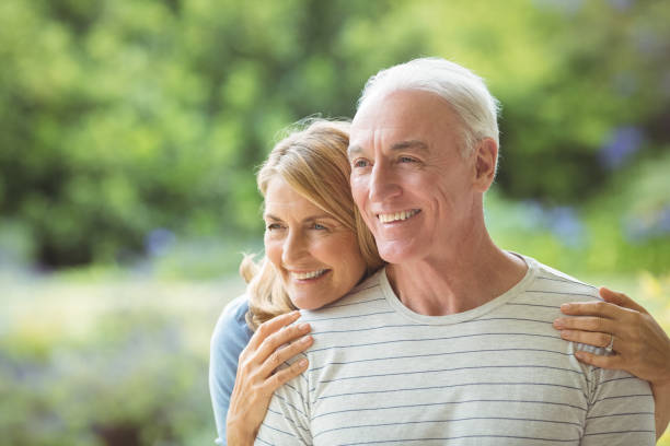 istock Senior couple embracing outdoors 645138050