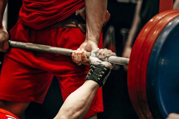 istock male athlete powerlifter bench press in powerlifting competitions 645150274
