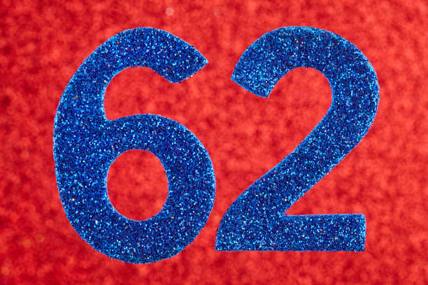 istock Number sixty-two blue color over a red background. Anniversary. 645155440