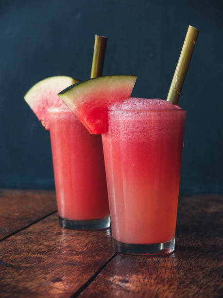 istock Fresh watermelon juice in two glasses with cane straws 645155832