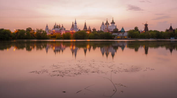 istock Izmailovo Kremlin reflecting in water in sunset time 645173454