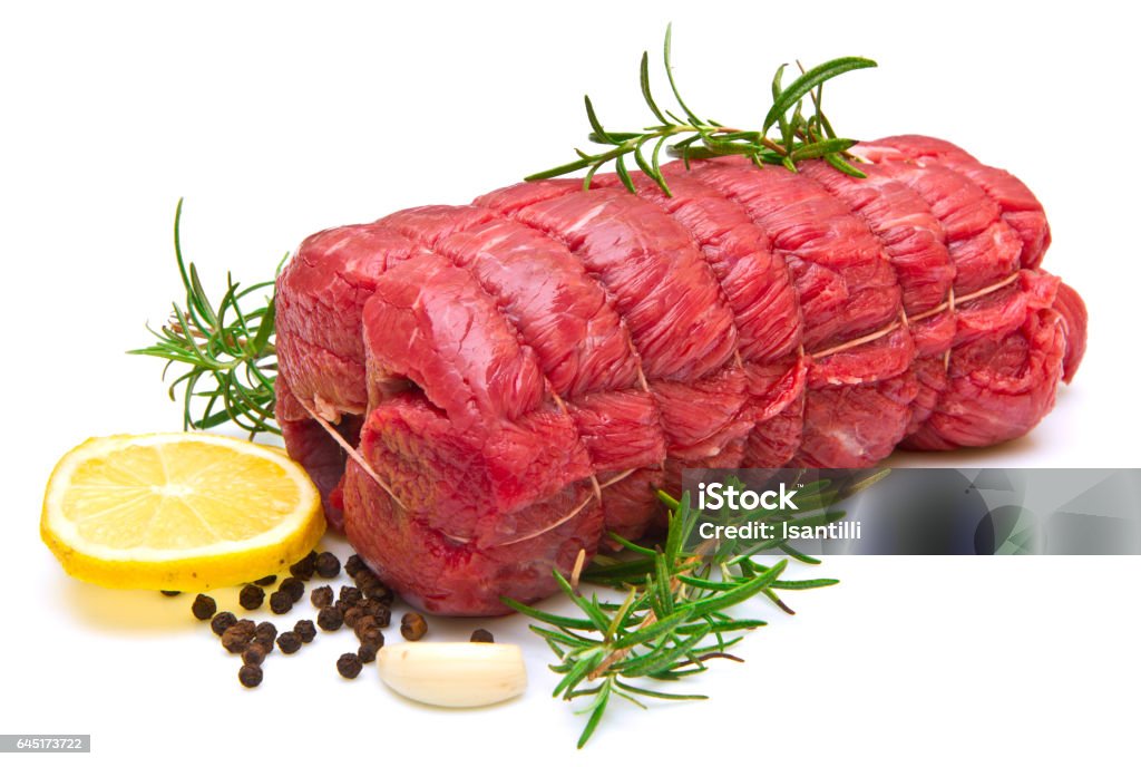 roast of beef with rosemary on white Barbecue Grill Stock Photo