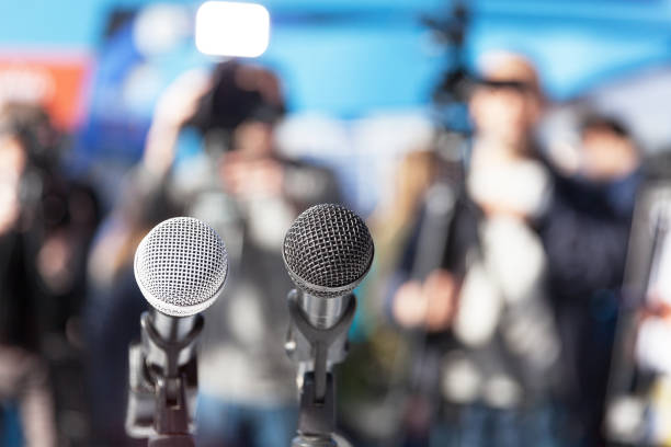 istock News conference. Microphones. 645173944