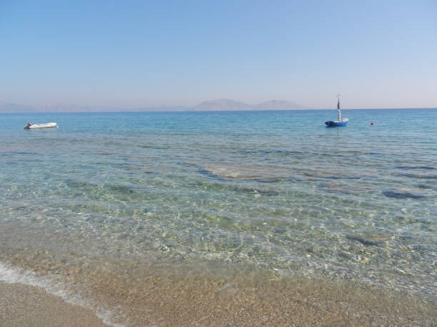 the beautiful beach in Faros in a sunny day, Ikaria Island, Greece