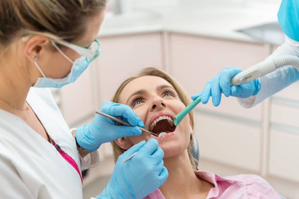 istock Female patient at dental hygiene 645180016