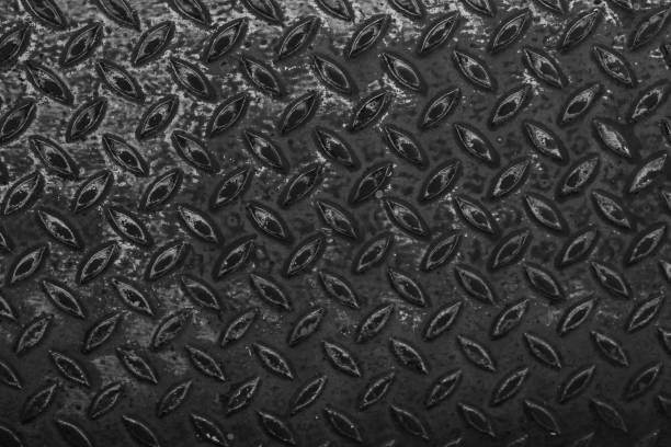 istock Dark metal floor plate texture background 645187874