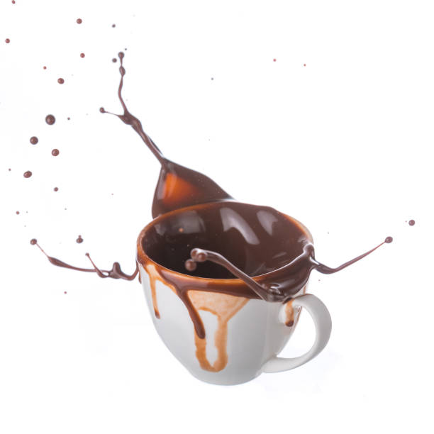 istock Hot chocolate splash in white cup isolated on white background 645188022