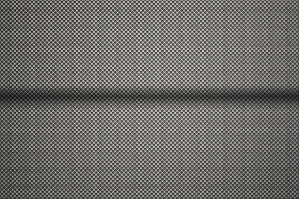 istock metal plate with many small circular holes. 645190190
