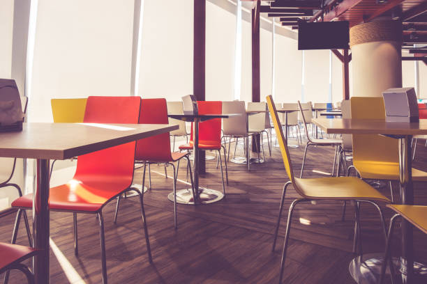 istock Tables and chairs in restaurant vintage color 645192448