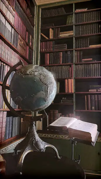 Photo of globe and book in a library depiction