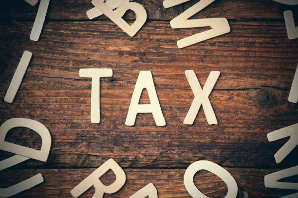 istock Tax topic in wood letter 645200026