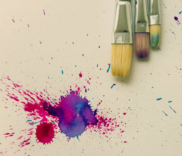 istock Beautiful and Colorful Flat lay with Brushes and Watercolor splashes 645204652