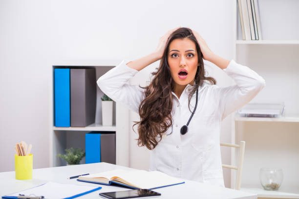 istock Female doctor  in panic 645214950
