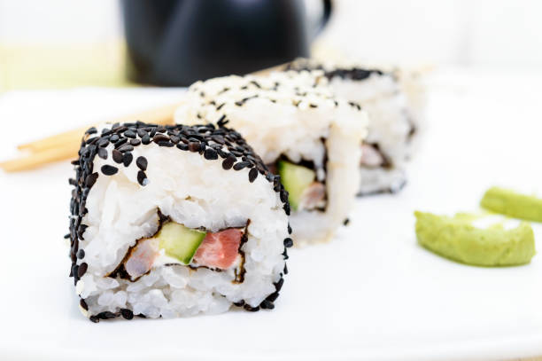 istock Traditional eastern dish with salmon, shrimp - sushi rolls 645224148
