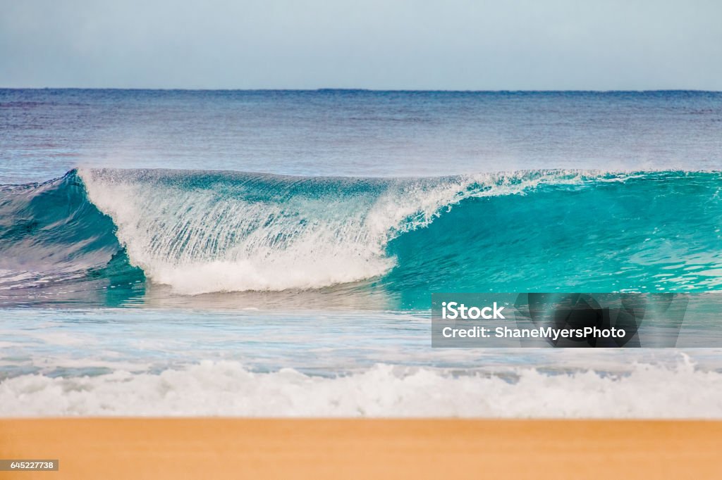 Surf at Bonzai Pipeline on Oahu's North Shore Beautiful waves highlight the winter on the North Shore of Oahu. Backgrounds Stock Photo
