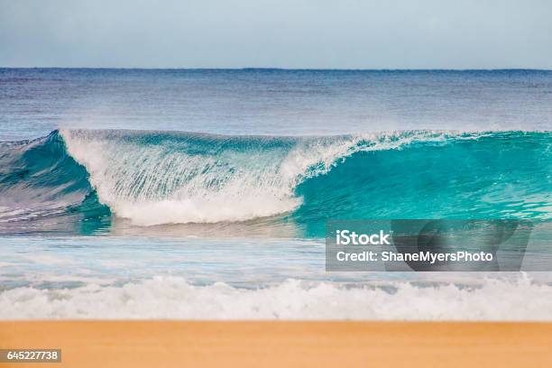 Surf At Bonzai Pipeline On Oahus North Shore Stock Photo - Download Image Now - Backgrounds, Banzai Pipeline, Beach