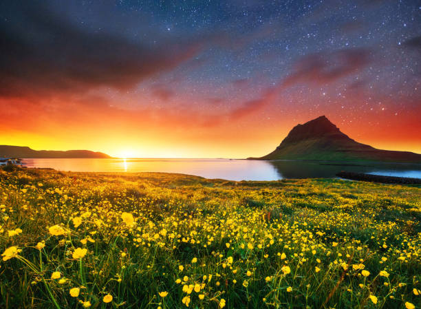 Fantastic views of the landscape of Iceland. A beautiful starry sky. Mountain Kirkyufetl.