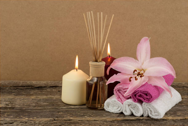 istock Composition with burning candles and aromatic oil 645230878