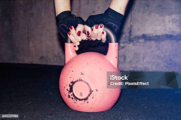Kettle Bell Held By Woman Stock Photo - Download Image Now - Kettlebell, One Woman Only, Women