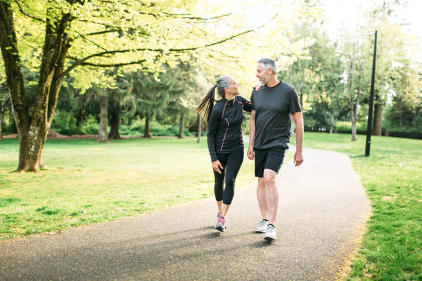 Mature Couple Exercising Outdoors