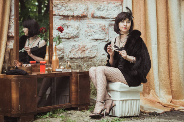 istock retro girl sitting at a dressing table 645246384