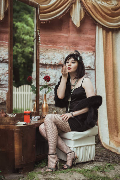 istock retro girl sitting at a dressing table 645248932