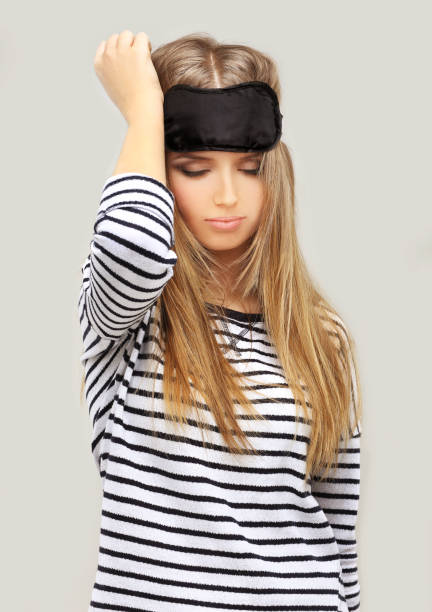 istock Problem.Crying girl.Girl with sleeping mask on her forehead 645255086