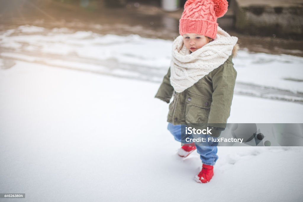 Cute Baby Girl Walking On Snow Stock Photo - Download Image Now - 18-23 Months, Arts Culture and Entertainment, Babies Only - iStock Cute Baby Girl Walking On Snow Stock Photo - Download Image Now - 18-23 Months, Arts Culture and Entertainment, Babies Only - iStock