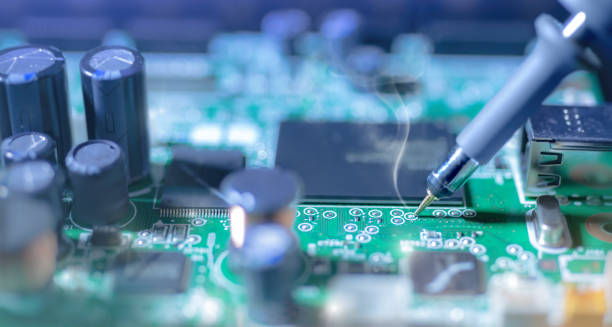 istock Electronic background: soldering of computer motherboard 645279760