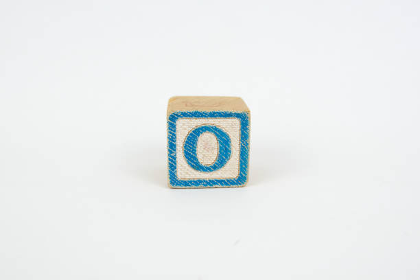 The Letter O in Colorful Wooden Childrenâs Blocks stock photo