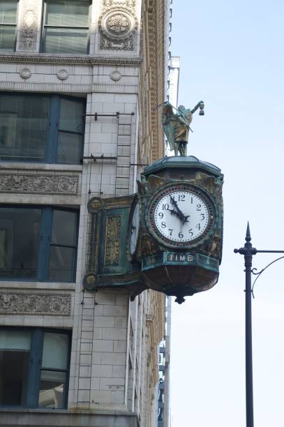 istock Clock on city street 645283112