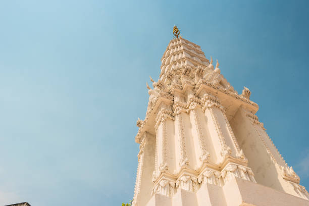 istock Stupas at Wat Intharawihan temple, Bangkok 645284672