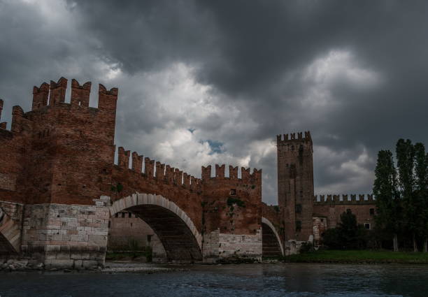Beautiful photo of medieval stone bridge Ponte Scaligero built in 14th century near Castelvecchio. Verona, Italy.