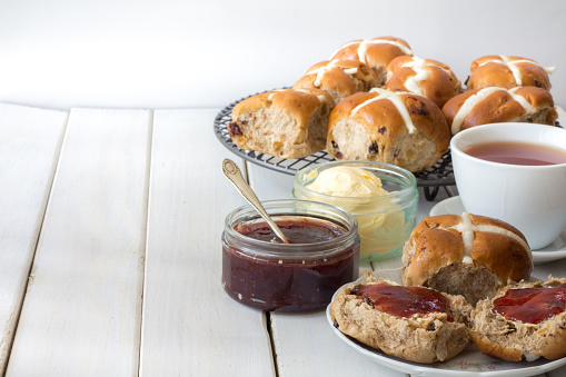 Hot Cross Buns with Jam and Butter Horizontal with Copy Space