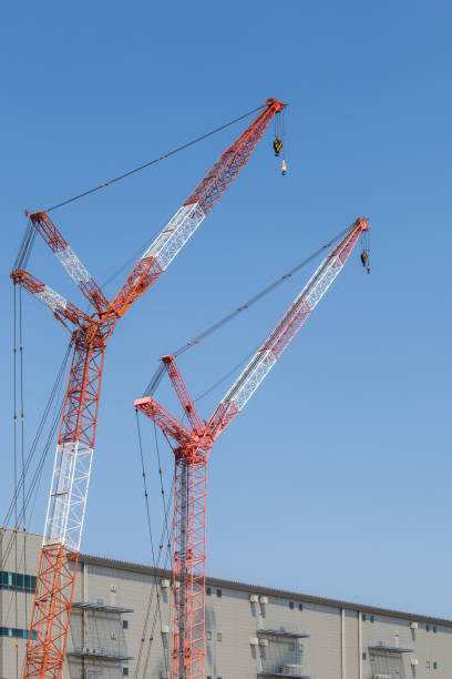istock Close - up big red crane at construction site 645313188