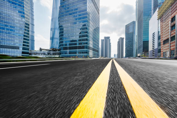 istock urban traffic road with cityscape 645319396