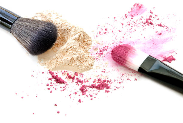 istock Make up powder and color eyeshadow crushed on white background 645324918